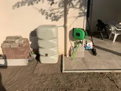 Installation d’une cuve de récupération d’eau de pluie + pose dévidoir mural